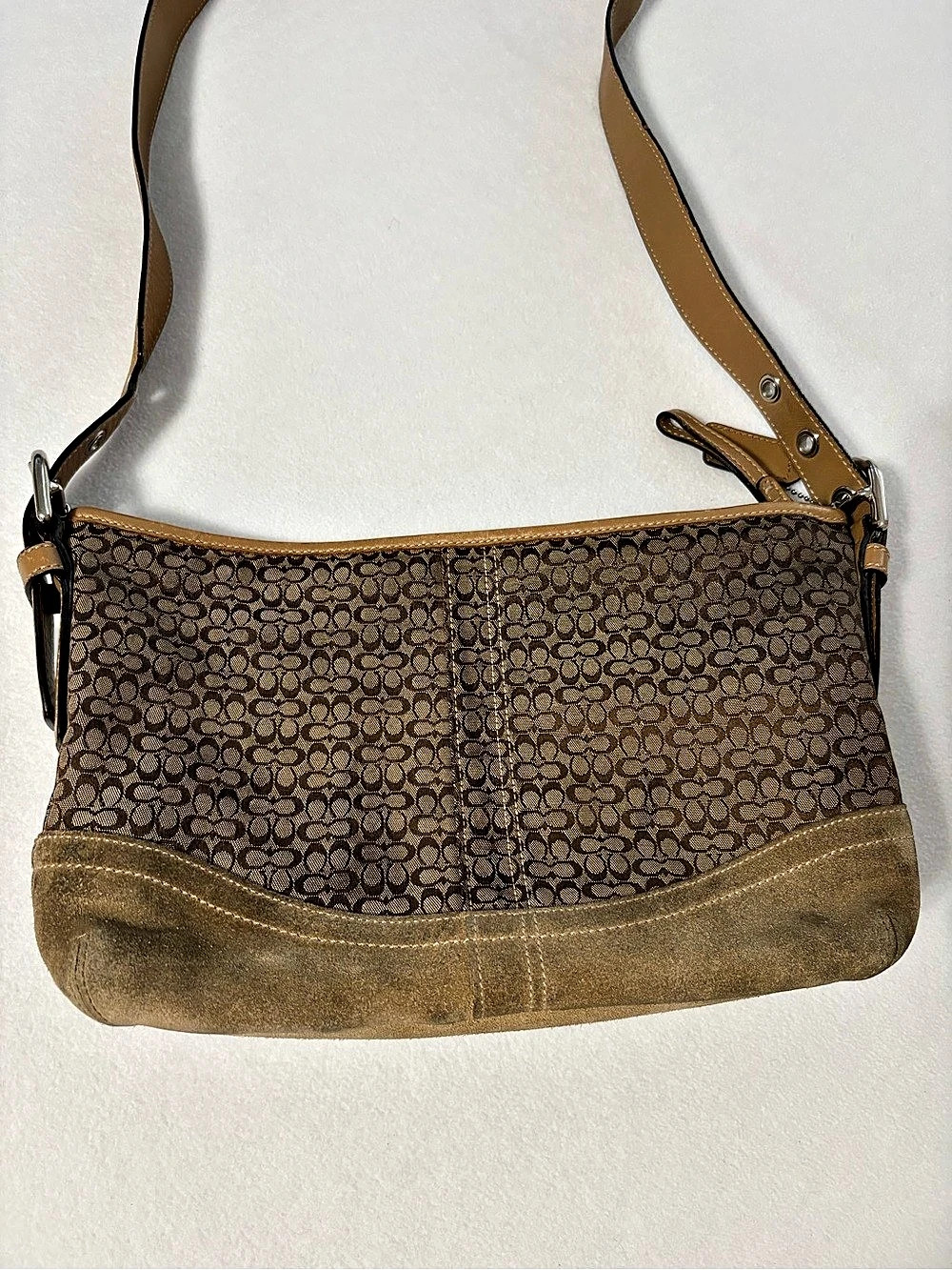 Coach Signature C Jacquard and suede trim shoulder bag, likely the Soho Hobo
